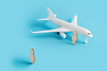 Passenger plane and miniature characters are a man and a woman. Concept of meeting, arrival, departure, parting and long business trip