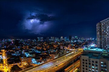 Fototapeta na wymiar Lightning strikes at night in Manila, Manila, Philippines, May 13, 2020