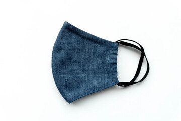 Top view blue fabric mask on white background