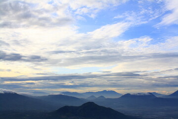 Fototapeta na wymiar Misty morning from Manglayang Mountain in Bandung, West Java, Indonesia.