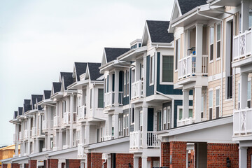 Row of new built American houses day light