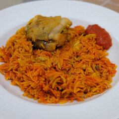 Nasi biryani or bryani rice served in a plate.