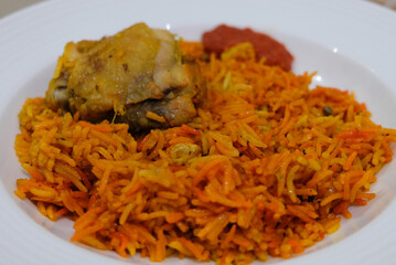 Nasi biryani or bryani rice served in a plate.