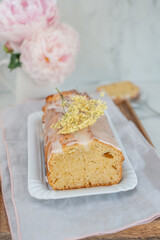 sweet home made elderflower sponge cake on a table