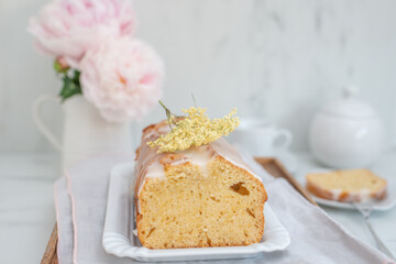 sweet home made elderflower sponge cake on a table