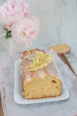 sweet home made elderflower sponge cake on a table