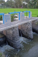 Irrigation system on river banks to regulate the irrigation of residents' agriculture