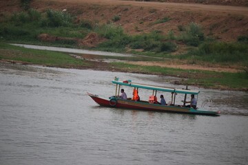 fishing boats on the river