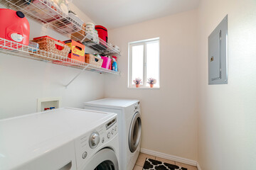 Laundry room in house with electrical appliances