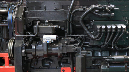Details and components of machines. Fragment of the diesel engine. Units and assemblies.
