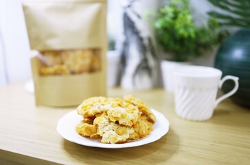 Cornflake cookies on wooden table. Selective focus