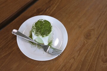 Japanese Matcha green tea cake with green tea topping.