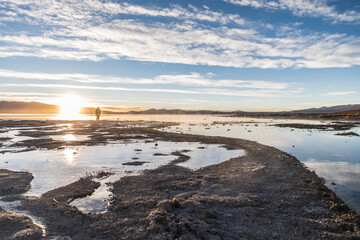 Sunrise in a beautiful landscape of a defrosting lake