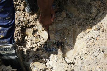 HDPE pipe leaking on ferrule connection is being repaired