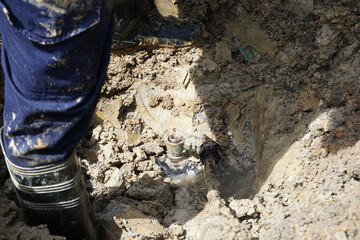 HDPE pipe leaking on ferrule connection is being repaired