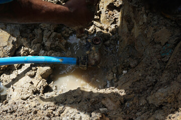 HDPE pipe leaking on ferrule connection is being repaired