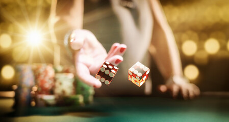 Man gambling at the craps table - obrazy, fototapety, plakaty