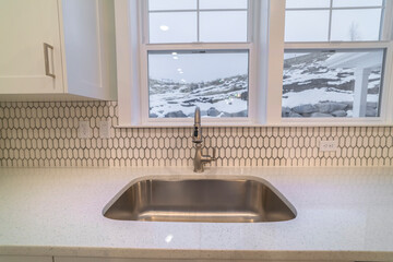 Stainless steel sink in a modern kitchen