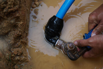 HDPE pipe leaking on ferrule connection is being repaired