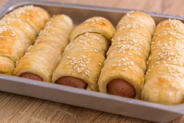 Freshly bakery sausage in dough