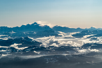 Fototapeta na wymiar Sunrise over Mont Blanc mountain range from a plane above french alps