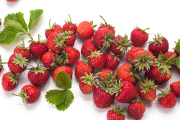 Strawberries with leaves. Isolated on a white background.