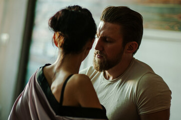 man and woman on the bed