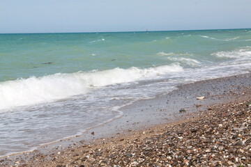 White Sand, The Beach And Splashing Waves.