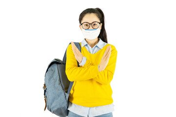 Young asian student woman in glasses wearing medical face mask,carrying a bag to go to school Under the outbreak of the virus isolated on white background