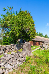 Stone walls and a barn in an old rural landscape