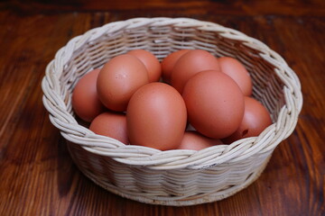 Close up Organic chicken eggs on the traditional bamboo basket
