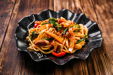 Asian cuisine vegetables udon noodles wok