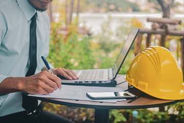 Man use computer notebook work form home for new normal social distancing,Man typing keyboard