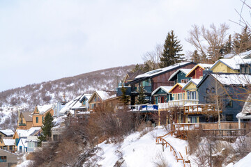 Residential houses on snowy mountain slope in scenic Park City Utah in winter