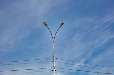 Street lamppost with two lamp. Street lamp on blue sky background