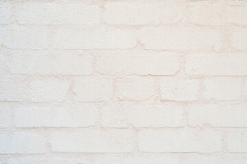 White brick wall. Facade of an old building. Architectural background.