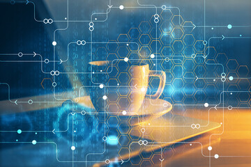 Double exposure of desktop computer and technology theme hologram. Concept of software development.