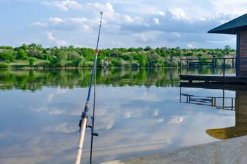Fishing rod on a beautiful landscape