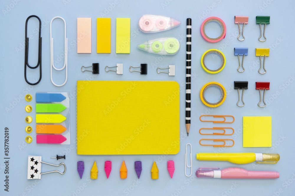 Poster different stationary objects on a table