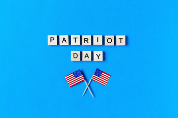 the inscription memorial day in wooden letters on a blue background. American flag. Holiday. Memorial day. top view. Copy space. patriot day.