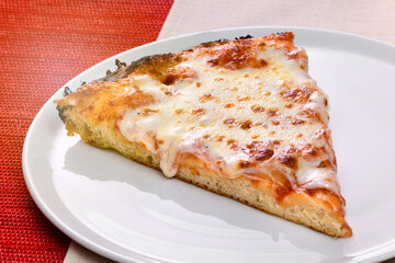 Slice of traditional Italian Margherita pizza