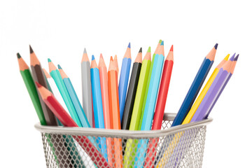 Colorful pencils in the case isolated on the white background.