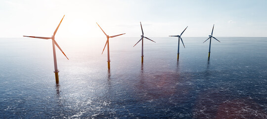 Offshore wind turbines farm on the ocean. Sustainable energy