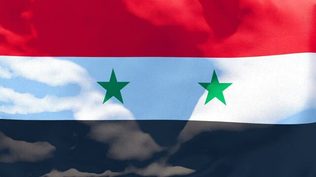 The national flag of Syria flutters in the wind