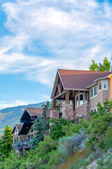 Hilltop houses on a residential neighborhood surrounded by scenic nature views