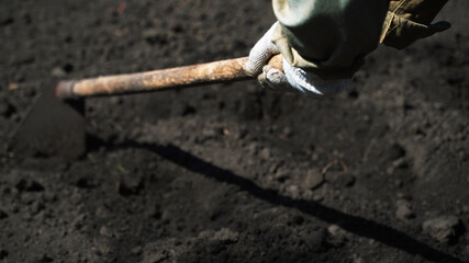 Land cultivation with hand tools