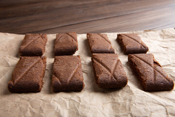 Chocolate cookies on wooden table.Homemade cookies closeup