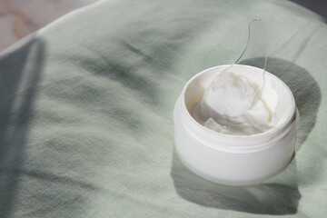  White jar mock face mask, minimal concept, anti-aging, proper home and spa face and neck skin care