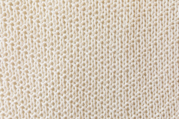  Loose Knitwear Fabric Texture. Repeating Machine Knitting of warm Sweater backdrop. White knitted fabric background. Retro abstract pattern with soft beige knitted cloth for decorative design.