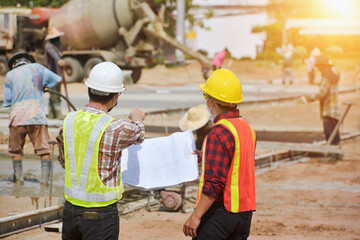 Surveyor engineer worker making measuring with theodolite on road works.survey engineer in...